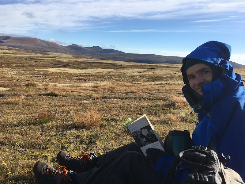 James Ellson outward bound with a book