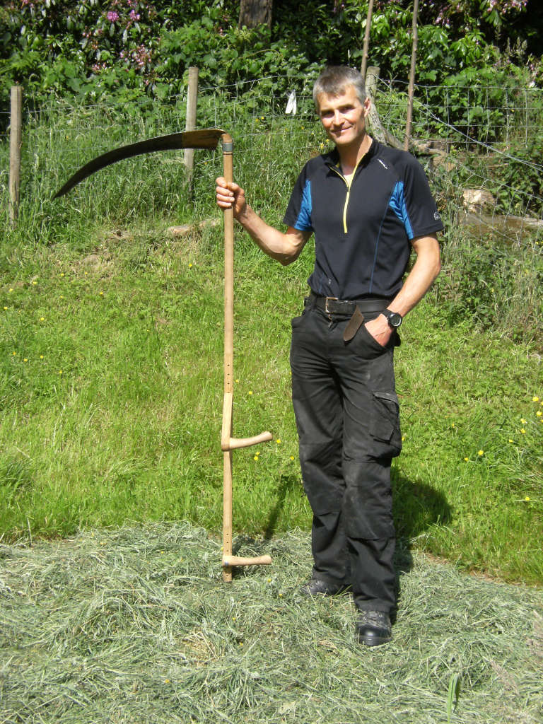 James Ellson Smallholding - James holding a scythe